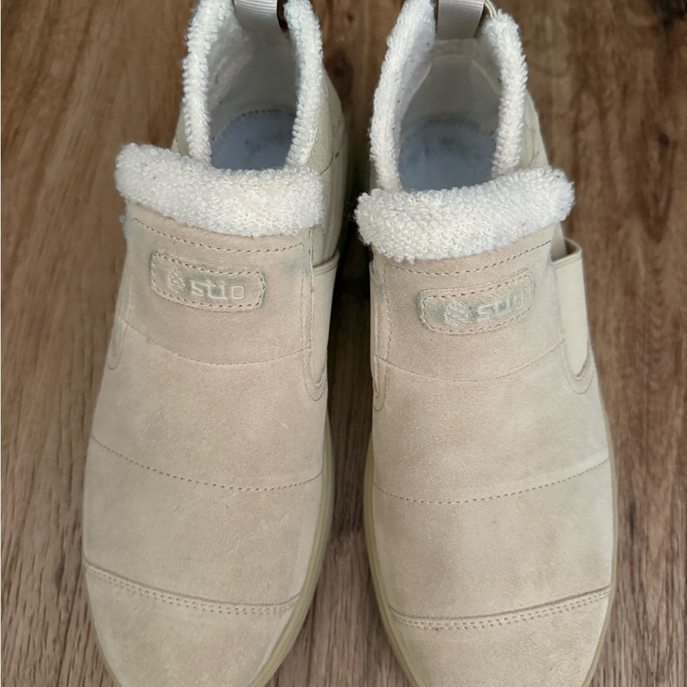Barely worn (maybe twice) Stio Tan Slip-On Shoes with Plush Lining. Comfy!